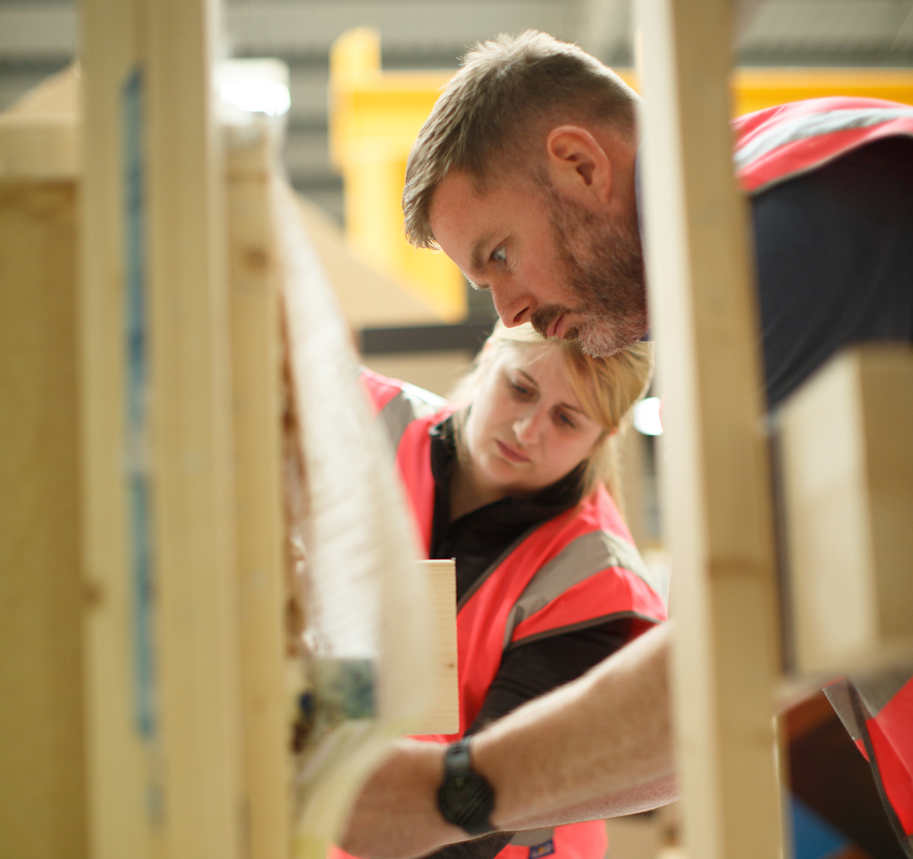 People working on building training rig