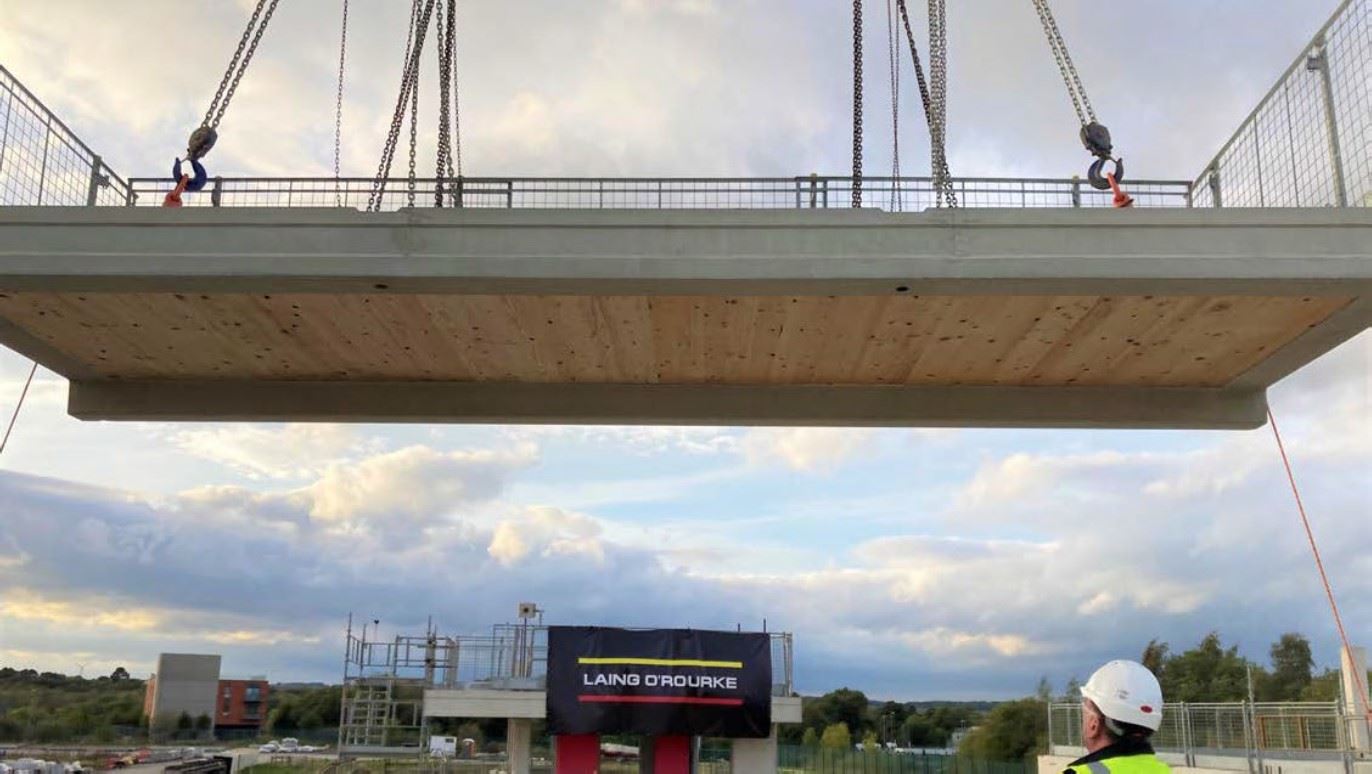 Timber concrete composite being craned